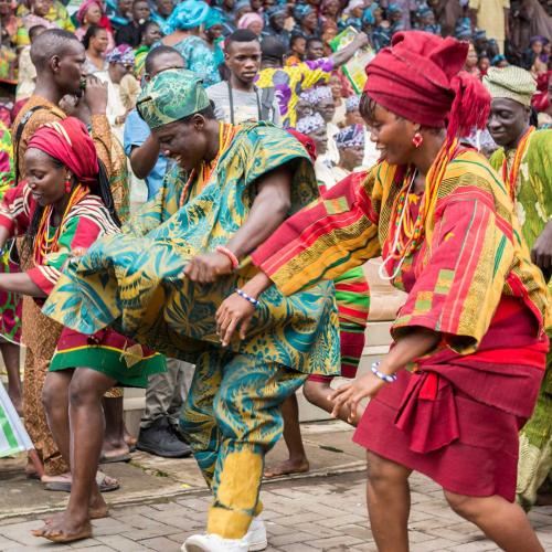 Women dancing in traditional African outfits